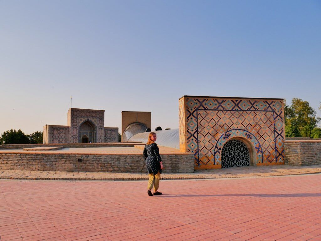 Woman walking around where the Samarqand Observatory was and is.
